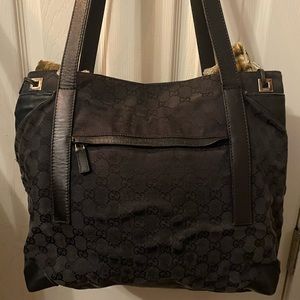 Lg. Gucci tote! Signs of wear, good cond. clean inside & out! Lots of life left!